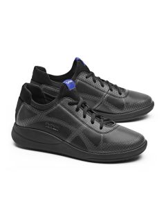 A comfortable black trainer with a black sole